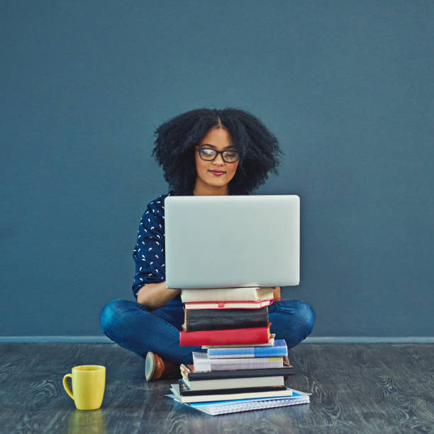 Student with stack of books